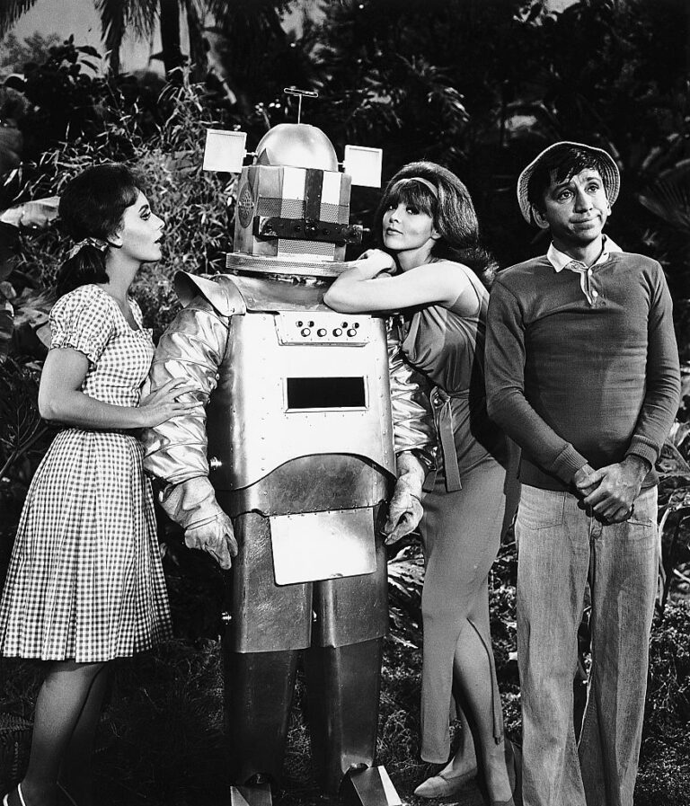 An Air Force robot is Bob Denver’s rival for the attentions of Dawn Wells and Tina Louise on “Gilligan’s Island” (Getty Images)
