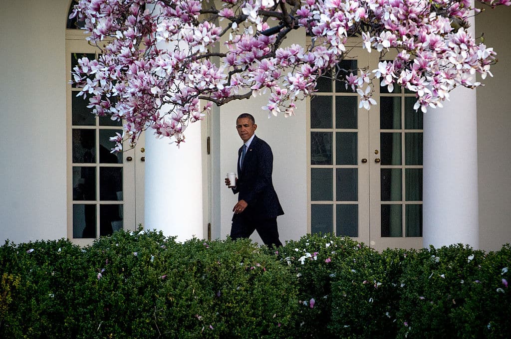 US President Barack Obama walks along the colonnade to the Oval Office after arriving in Marine One on the South Lawn of the White House April 10, 2014. Obama returned from a two-day trip to Texas. Photo Ken Cedeno (Photo by Ken Cedeno/Corbis via Getty Images)